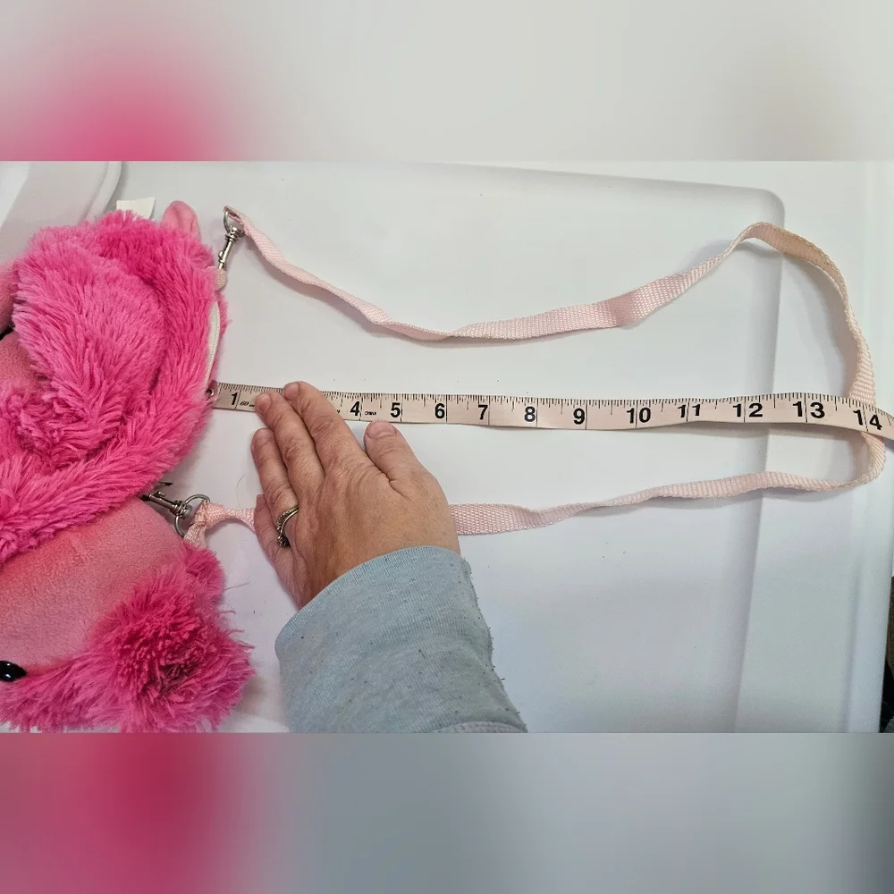 Source Unknown pink plush